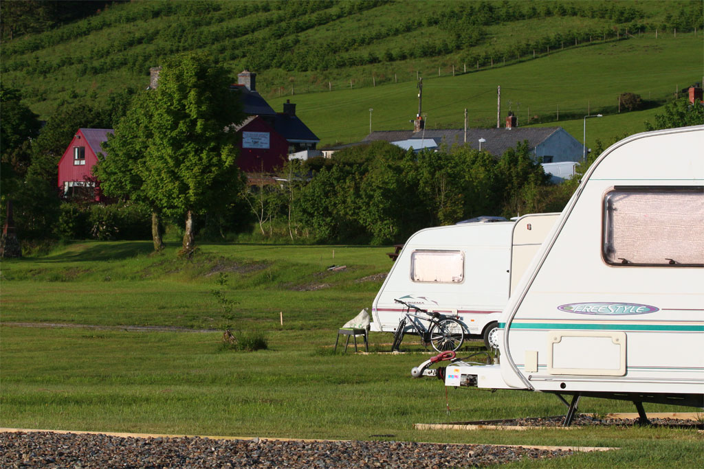 Caravans with Tafarn Sinc in the background